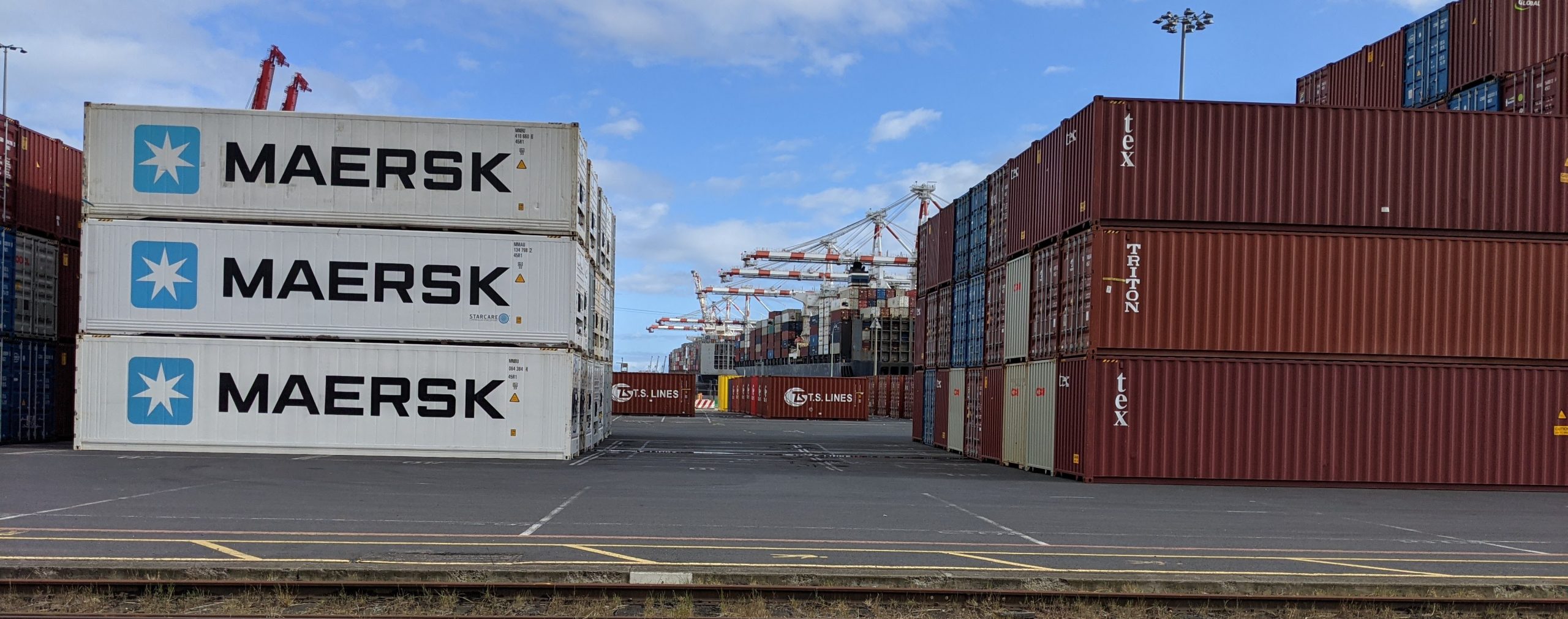 Shipping containers stacked in a lot